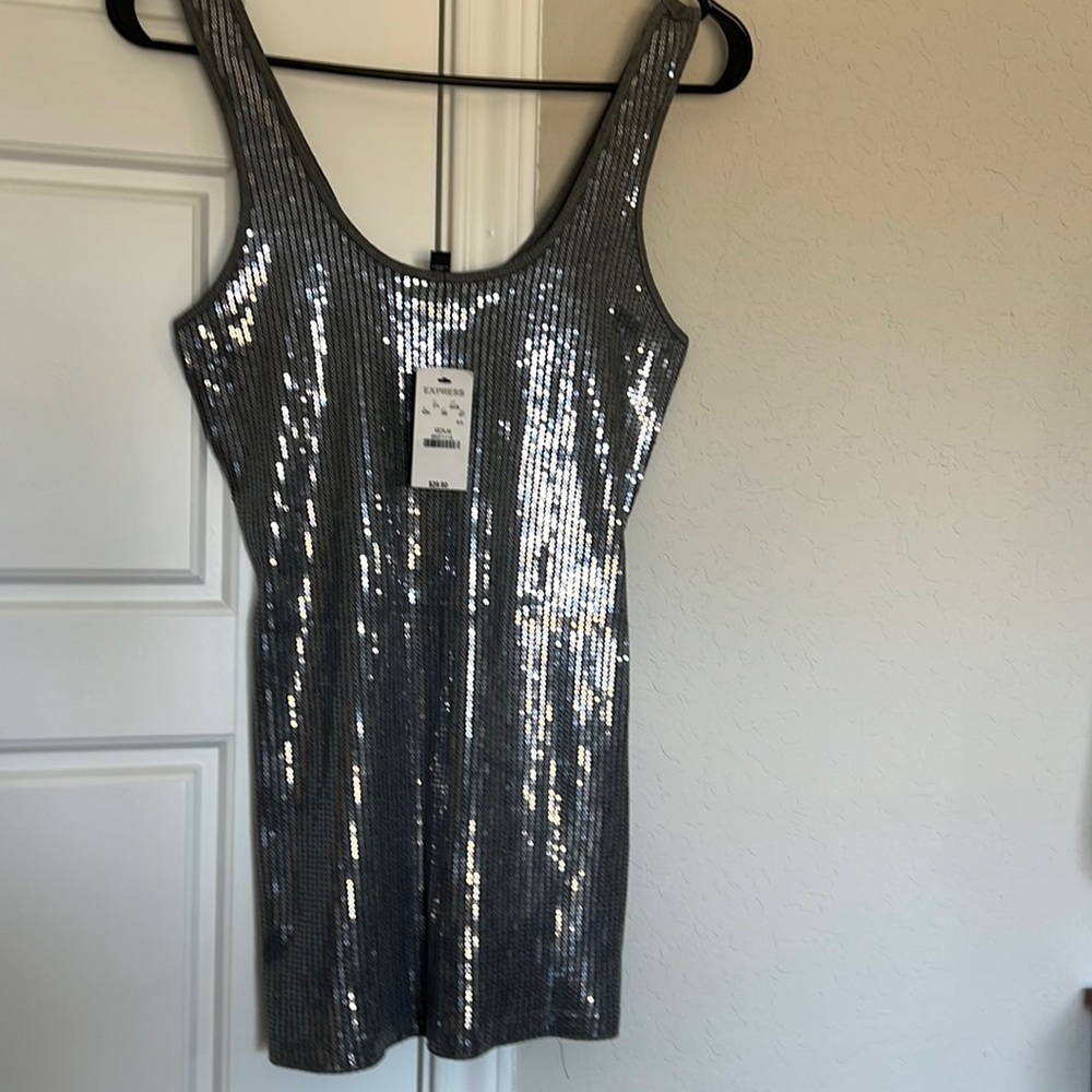 NWT express shiny beautiful tank top size Medium.
